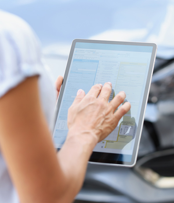 Agent driver filling out insurance claim